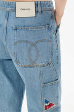 Load image into Gallery viewer, Chanel Coco Neige Carpenter Jeans in Light Blue Denim, CC stitched back pocket