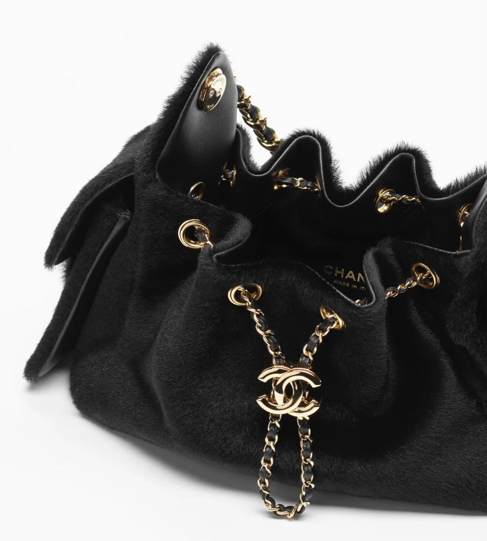 Chanel 25 Mini Handbag in Black Lambskin