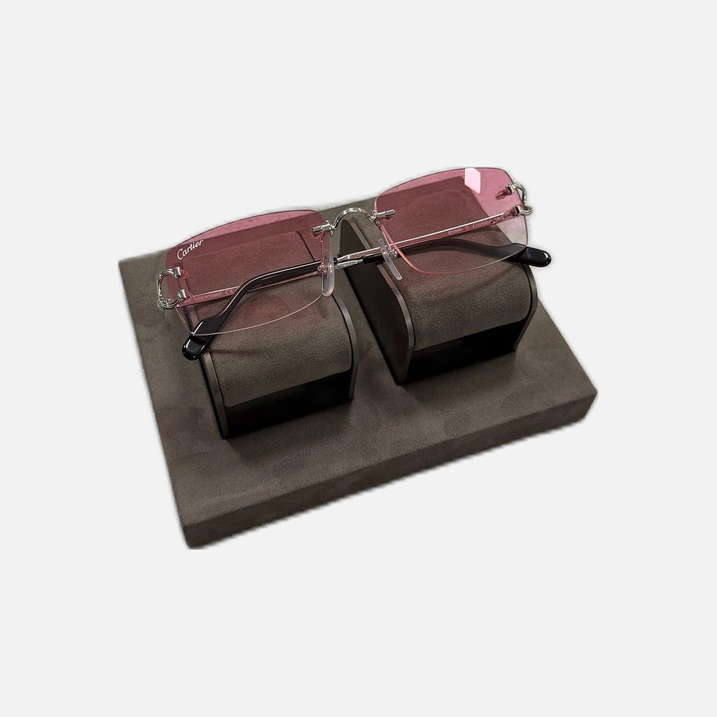 Cartier CC sunglasses with a silver frame and pink tint lenses, view 2