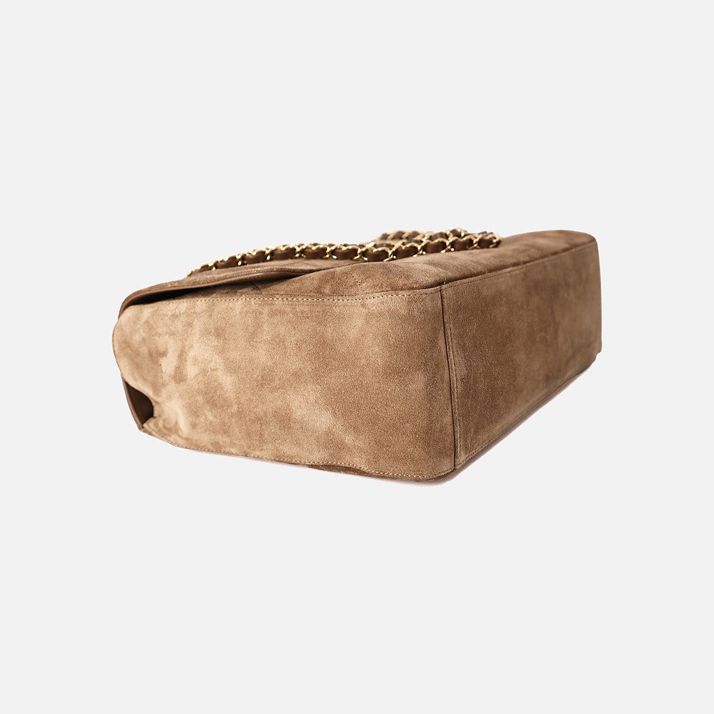 Chanel 26K Maxi Flap Bag 38.5 in Dark Beige Suede with Gold Hardware, angled