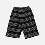 Load image into Gallery viewer, Chrome Hearts After School flannel shorts in black with a leather scroll patch, view 2