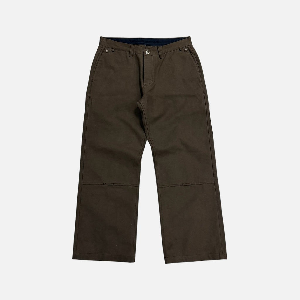 Chrome Hearts carpenter trousers in brown with a leather cross patch on the rear pocket, view 2