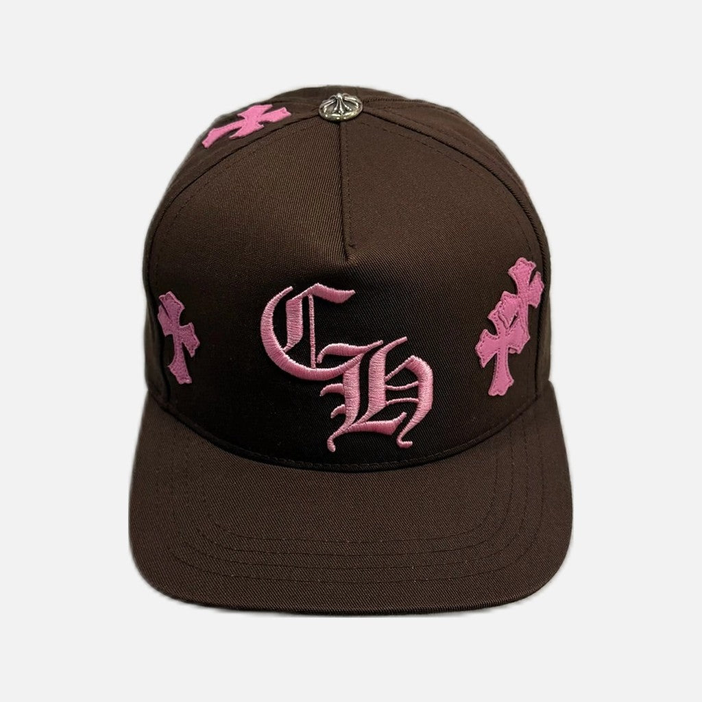 Chrome Hearts snapback cap in brown and pink with leather cross patch and CH branding