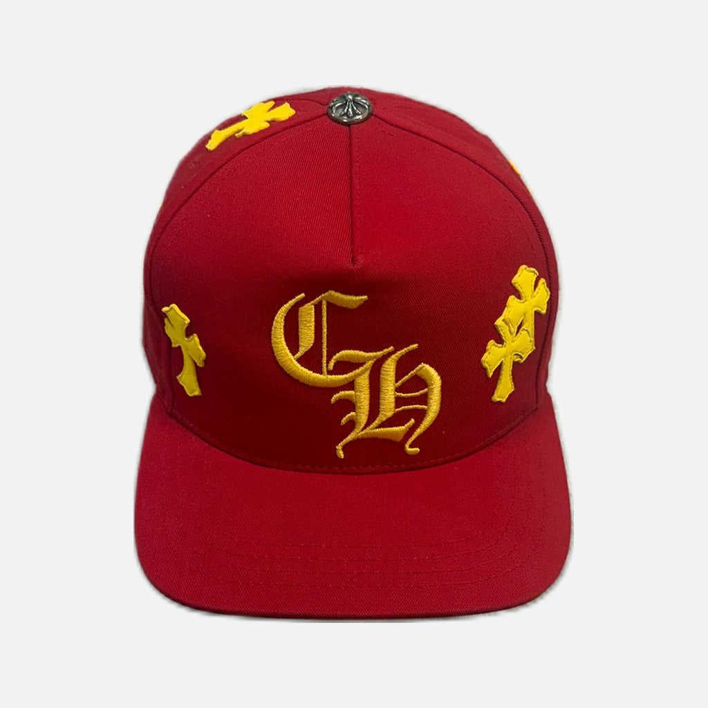 Chrome Hearts snapback cap in red and yellow with leather cross patch and CH branding