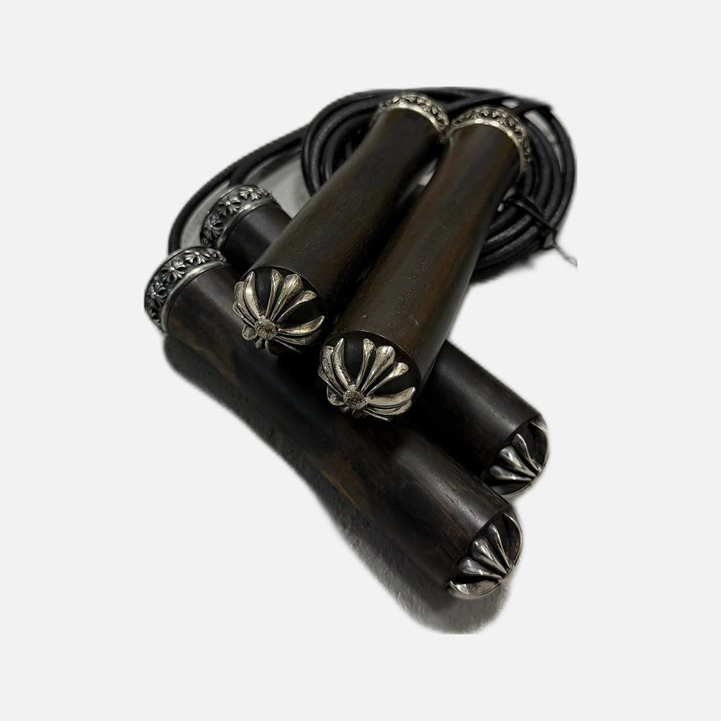 Chrome Hearts skipping jump rope in mahogany dark wood and leather with silver plus detailing