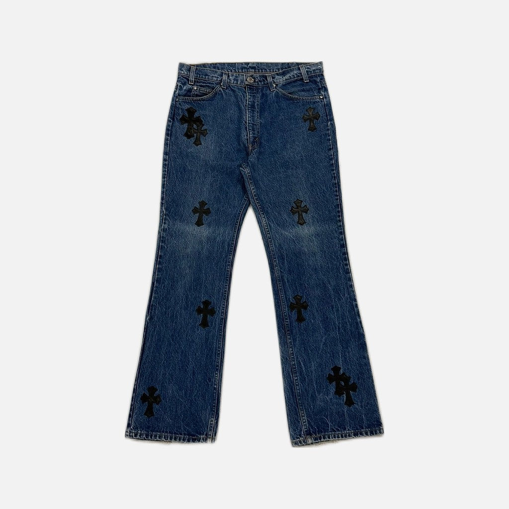 Chrome Hearts vintage Levi's 517 flared jeans in blue wash denim with leather cross patches