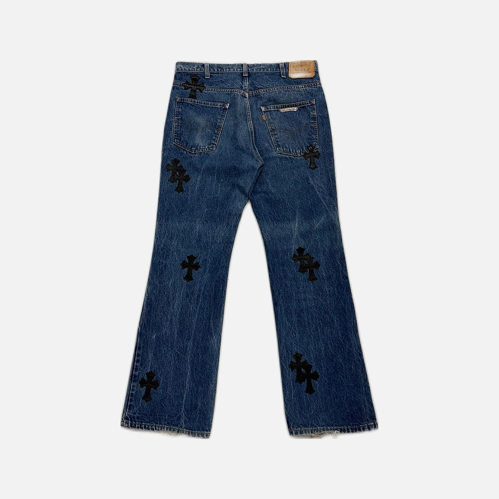 Chrome Hearts vintage Levi's 517 flared jeans in blue wash denim with leather cross patches, view 2