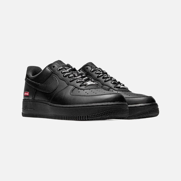 Nike x Supreme Air Force 1 Low Box Logo sneakers in black leather with red box logo on the heel