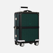 A Goyard 70cm square spinner suitcase in their signature Goyardine pattern, featuring a dark green and black geometric print, black trim, silver-tone hardware, and an extended telescoping handle, set against a solid off-white background.