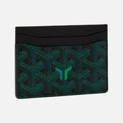 A Goyard card holder wallet featuring the brand's signature dark green and black chevron pattern with a green 'G' logo on the front, set against a solid off-white background.