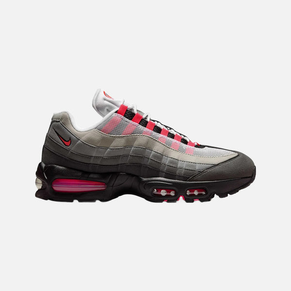 Nike Air Max 95 OG Solar Red sneaker in white mesh with synthetic leather overlays and visible Air units