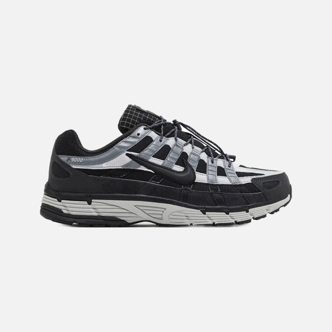 Nike P-6000 Premium sneaker in dark anthracite mesh with smoke grey leather overlays and metallic accents